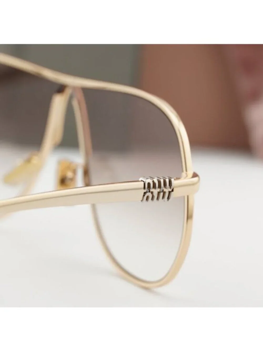 Miu Miu MUA56S 5AK90L Geometric Sunglasses – Gold/Brown Gradient